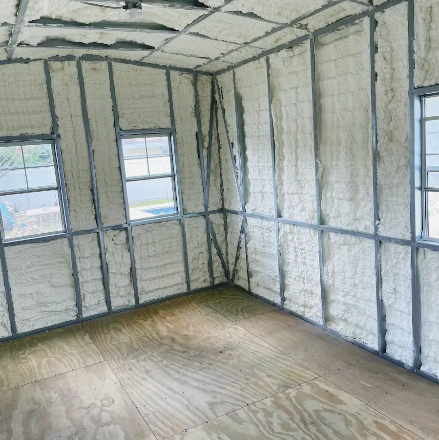 Closed-cell spray foam insulation applied to wall cavities in a residential project in Aston